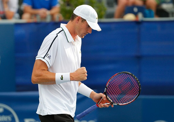 Isner celebrates his win against Radek Stepanek at the Atlanta Open