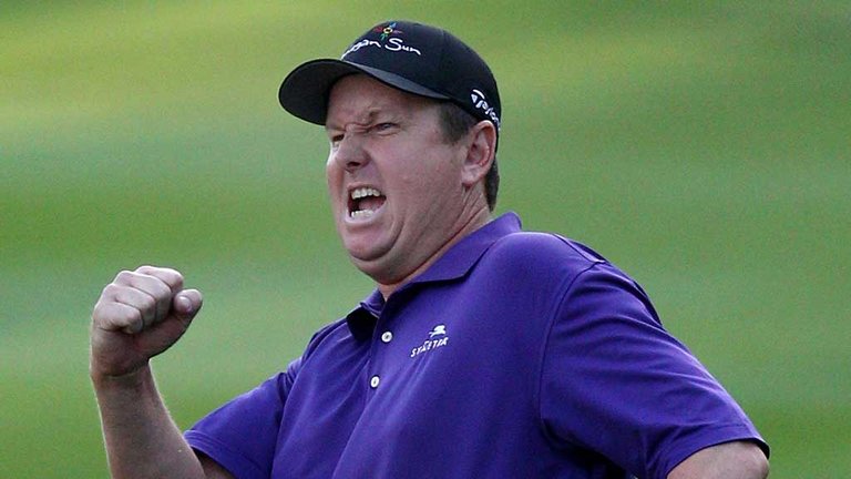 JJ Henry celebrates holing his winning putt at the Barracuda Championship