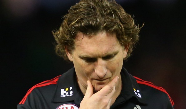 MELBOURNE AUSTRALIA- JULY 05 James Hird the coach of the Bombers looks dejected as he leaves the field after losing the round 14 AFL match between the Essendon Bombers and the St Kilda Saints at Etihad Stadium