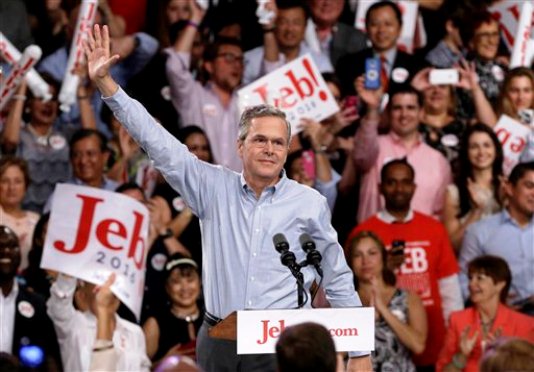 Former Florida Gov. Jeb Bush waves as he arrives to announce his bid for the Republican presidential nomination Monday