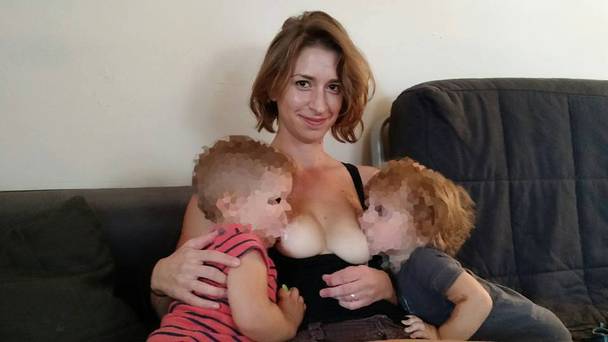 Woman breastfeeds both her son and child she babysits