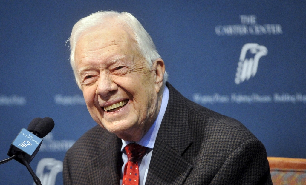 Former President Jimmy Carter takes questions from the media during a news conference about his recent cancer diagnosis and treatment plans