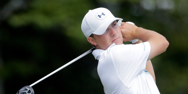 Jordan Spieth earned his first major title in historic style at Augusta National in April