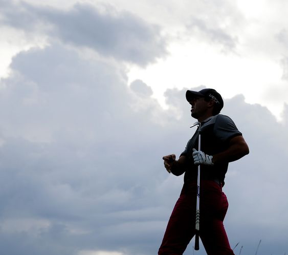 Northern Ireland watches a shot on the 15th hole during the first round of the PGA Championship golf tournament Thursday Aug. 13 2015 at Whistling Straits in Haven Wis