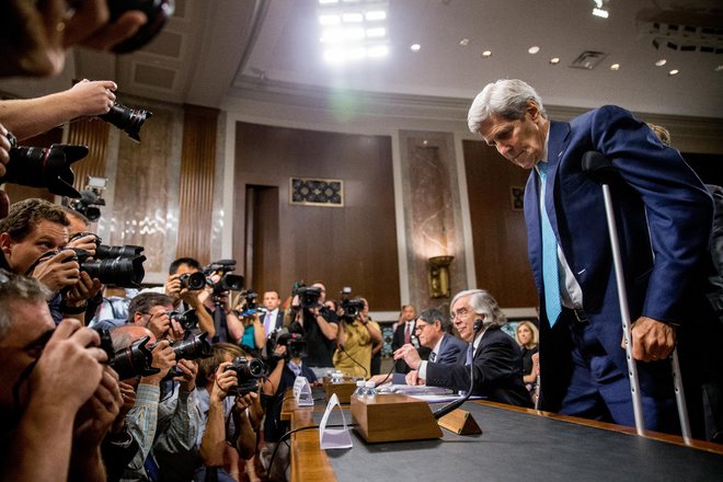 Secretary of State John Kerry right Secretary of Energy Ernest Moniz second from right and Secretary of Treasury Jack Lew third from right arrive to testify at a Senate Foreign Relations Committee hearing on Capitol Hill in Washington Thursday Ju