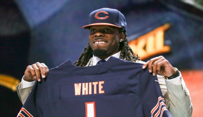 CHICAGO IL- APRIL 30 Kevin White of the West Virginia Mountaineers holds up a jersey after being chosen #7 overall by the Chicago Bears during the first round of the 2015 NFL Draft at the Auditorium Theatre of Roosevelt University