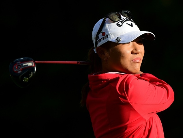 Lydia Ko of New Zealand hits a tee shot on the 11th hole during the first round of the Canadian Pacific Women's Open at the Vancouver Golf Club in Coquitlam