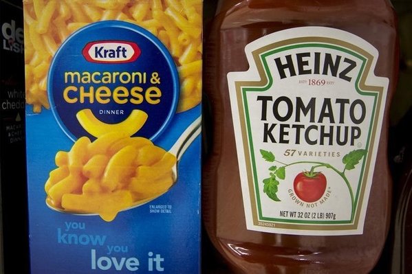 A box of Kraft macaroni and cheese and a Heinz Ketchup bottle are displayed together on a grocery store shelf in New York