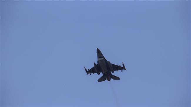 A missile-loaded Turkish Air Force warplane takes off from the Incirlik Air Base in the outskirts of the city of Adana to strike targets in Syria