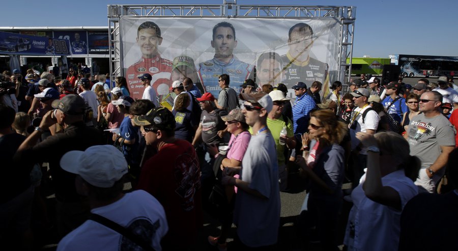 Fans enter a new souvenir superstore behind the grandstands at Pocono Raceway Friday