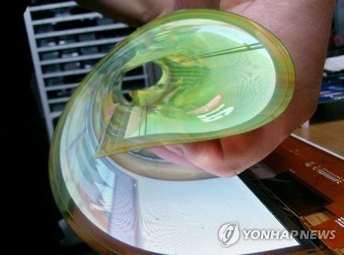 The flat panel maker unveiled Thursday a plan to build a new factory for the flexible OLED production by 2017