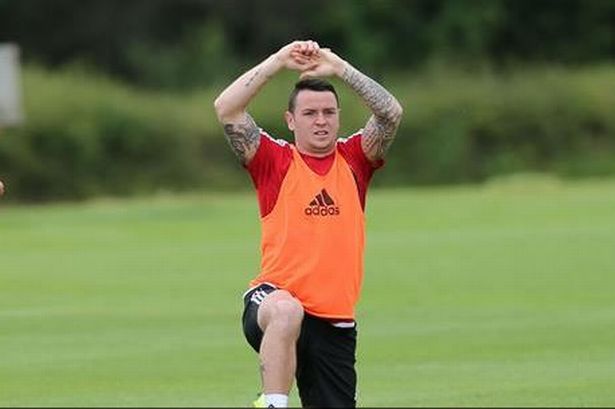 Lee Tomlin in pre-season training