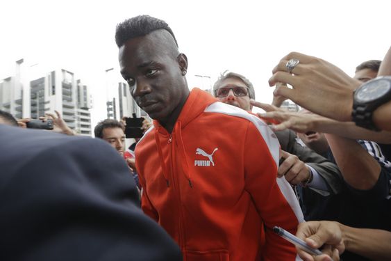 Mario Balotelli arrives at AC Milan headquarters in Milan Italy Tuesday Aug. 25 2015. AC Milan's vice president Adriano Galliani said the club is in talks with Liverpool about bringing striker Mario Balotelli back to Ser