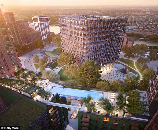 A pair of luxury apartment blocks in Battersea London will be linked by a swimming pool suspended 115 feet in the air Above an artist's impression of the development