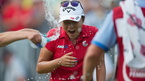 Lydia Ko has water splashed on her after her victory