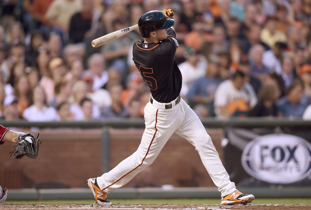 SAN FRANCISCO CA- AUGUST 15 Matt Duffy #5 of the San Francisco Giants hits a bases loaded three-run RBI double against the Washington Nationals in the bottom of the third inning at AT&T Park