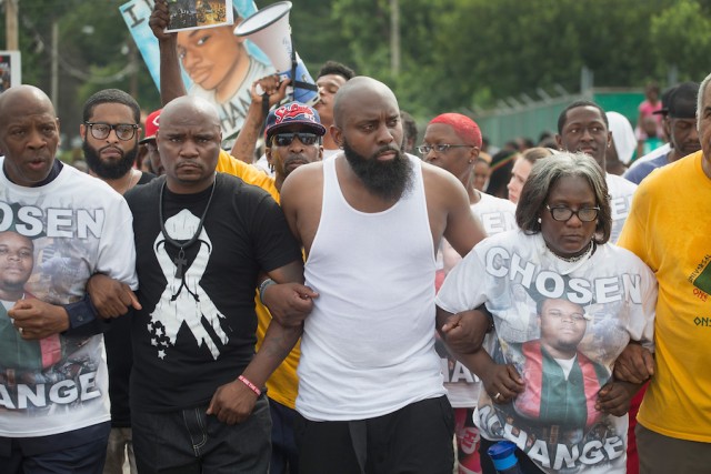 Michael Brown Sr urges protesters to step up efforts on shooting anniversary