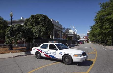 A police cruiser sat outside of the Muzik nightclub in Toronto on Tuesday hours after an early-morning shooting there