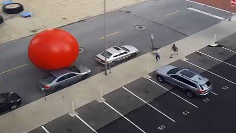 Giant Red Ball Escapes Toledo Museum story image