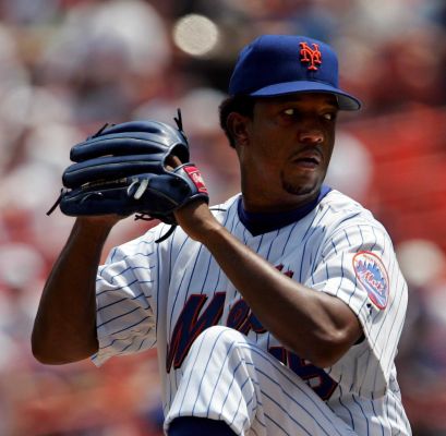 Mets Pedro Martinez pitches against the Cincinnati Reds