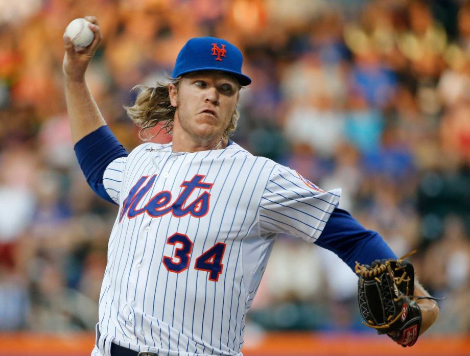 New York Mets starting pitcher Noah Syndergaard delivers in the first inning of a baseball game against the San Diego Padres in New York Tuesday