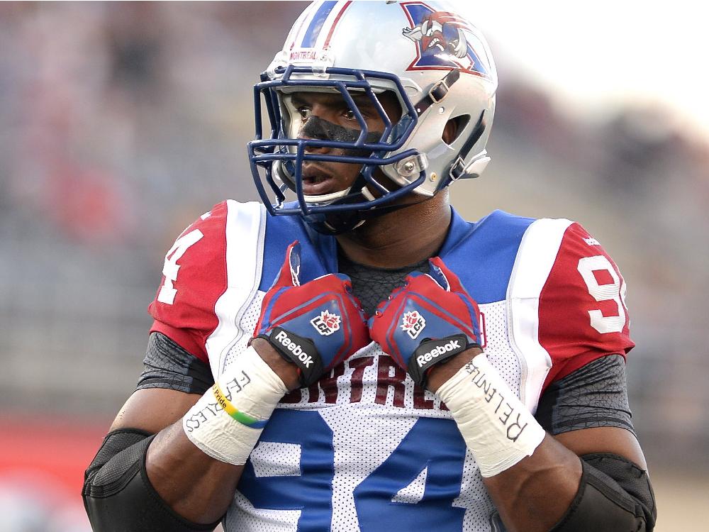 Montreal Alouettes&#039 Michael Sam is set to make his pro football debut as he warms up before the first half of a CFL game against the Ottawa Redblacks in Ottawa on Friday Aug. 7 2015