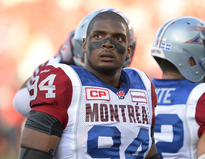 Montreal Alouettes Michael Sam and teammates warm up for a Canadian Football League game against the Ottawa Redblacks in Ottawa Ontario. Sam is stepping away from pro football. Sam the first openly gay player