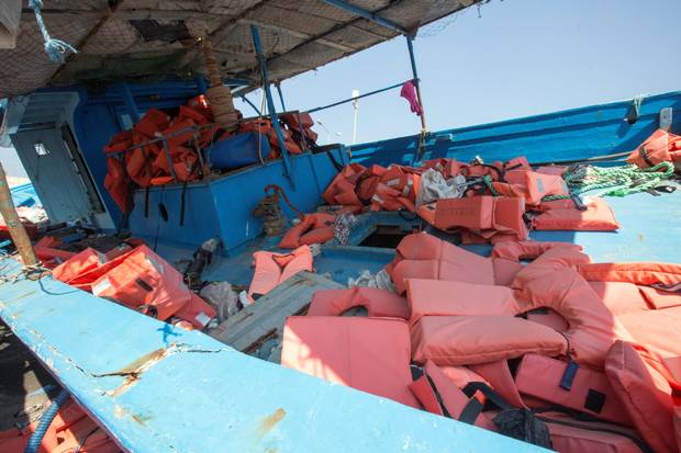 Migrant boats in Pozzallo harbour Sicily