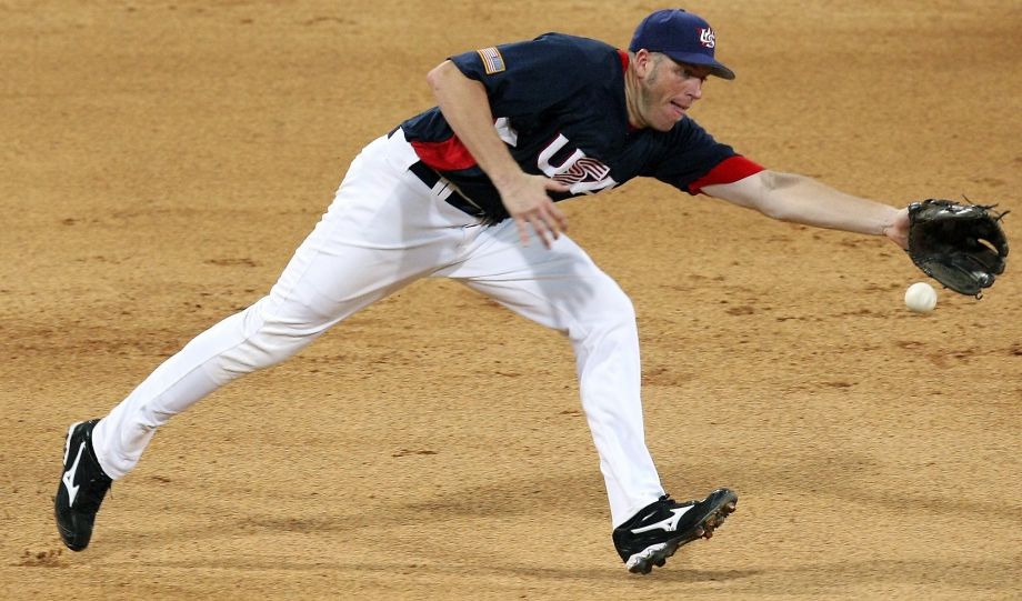 FOR SPORTS- USA's Mike Hessman fields a ball against Korea during their preliminary game at the 2008 Beijing Olympics Wednesday Aug 13 2008 in Beijing China. Korea won 8-7