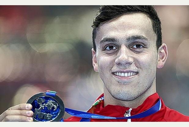 Millfield swimmer James Guy shows his World Championship silver medal