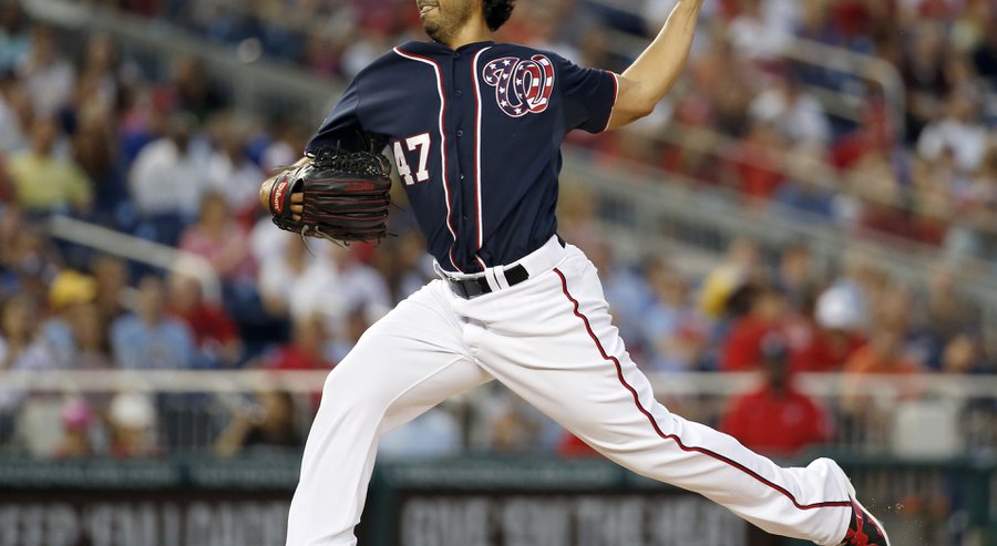 Washington Nationals starting pitcher Gio Gonzalez throws during the third inning of a baseball game against the Milwaukee Brewers at Nationals Park