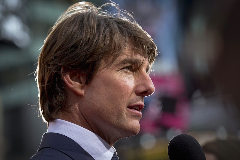 Actor Tom Cruise poses on the red carpet for a screening of ‘Mission Impossible Rogue Nation’ in New York