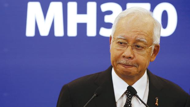 Malaysia's Prime Minister Najib Razak confirms the debris found on Reunion Island is from missing Malaysia Airlines flight MH370