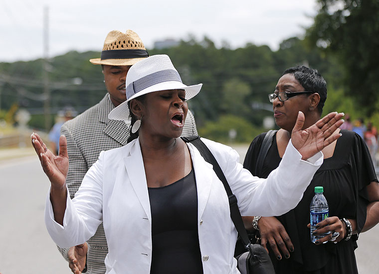 Leolah Brown talks with media members outside the church hosting a funeral service for her brother Bobby Brown's daughter Bobbi Kristina Brown on Saturday Aug. 1 2015 in Alpharetta Ga