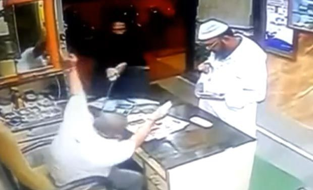 Video: Scary footage of Indian shopkeeper being attacked with a sword