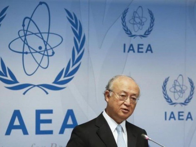 International Atomic Energy Agency Director General Yukiya Amano addresses a news conference after a board of governors meeting at the IAEA headquarters in Vienna Austria