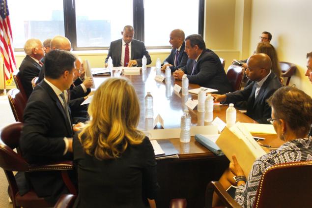 U.S. Transportation Secretary Anthony Foxx, Sen. Cory Booker, New Jersey Gov. Chris Christie, and federal transit officials discuss the commuter rail tunnel plans