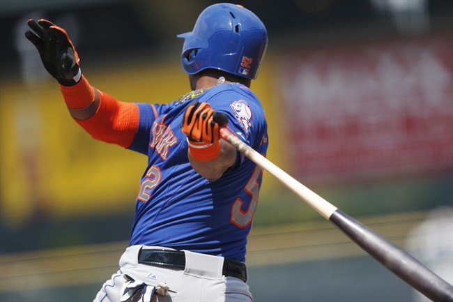 New York Mets Yoenis Cespedes strikes out to Colorado Rockies starting pitcher David Hale during the first inning of a baseball game