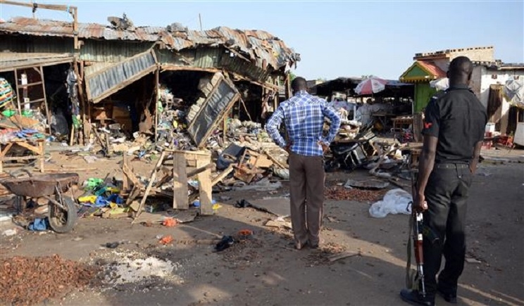 War on terror Boko Haram kills 9 set houses ablaze in Nigeria