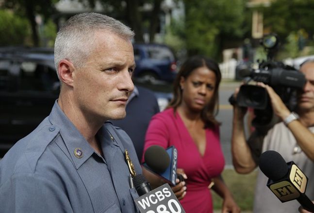 Sgt. Daniel Wilson left speaks to reporters about the search for Chelsea O'Donnell in Nyack N.Y. Tuesday Aug. 18 2015. Police are searching for Rosie O'Donnell's 17-year-old daughter Chelsea who has not been seen since leaving the family's home nor