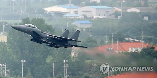 A South Korean F-15K combat jet takes off from an air base in Daegu on Aug. 22 2015 to join a joint air force exercise with U.S. F-16 fighter jets amid fears of additional North Korean attacks