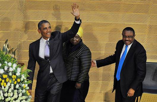 US President Barack Obama, alongside African Union Chairperson Nkosazana Dlamini Zuma, and Ethiopian Prime Minister Hailemariam Desalegn arrives to speak about security and economic issues and US-Africa relations in Africa at the African Union He