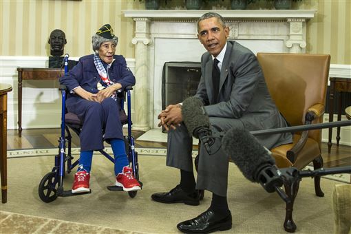 President Barack Obama meets with Emma Didlake 110 of Detroit the oldest known World War II veteran in the White House in Washington