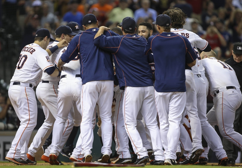 Jul 23 2015 Houston TX USA Houston Astros players celebrate a walk off victory over the Boston Red Sox after second baseman Jose Altuve hits a home run during the ninth inning at Minute Maid Park. The Astros defeated the Red Sox 5-4. Mandatory C