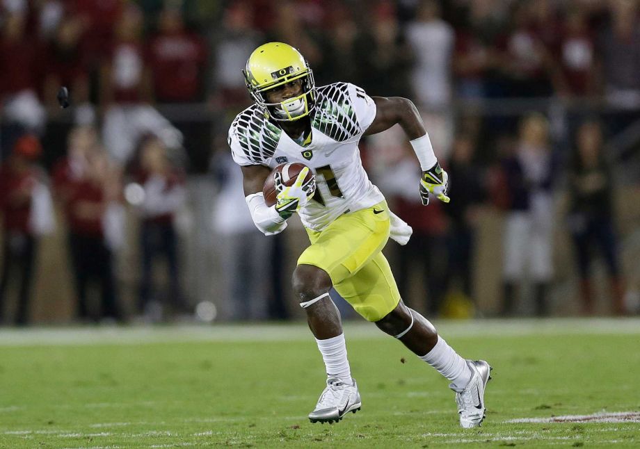 Oregon wide receiver Bralon Addison carries the ball against Stanford during an NCAA college football game in Stanford Calif. Addison was a breakout star at receiver for the Ducks in 2013 with 61 catches for