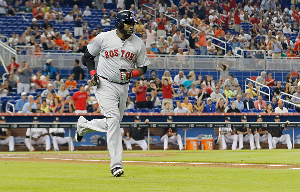 MIAMI FL- AUGUST 12 David Ortiz #34 of the Boston Red Sox runs the bases after hitting a second inning solo home run against the Miami Marlins at Marlins Park