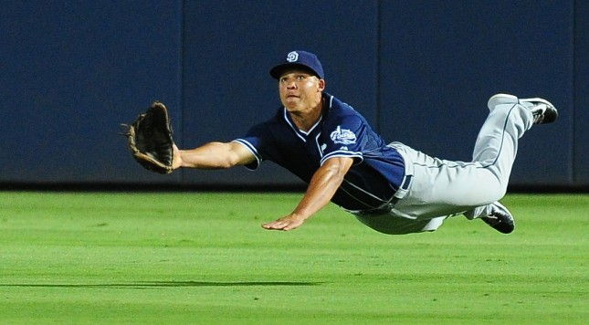 ATLANTA GA- JUNE 10 Will Venable #25 of the San Diego Padres is unable to make a diving catch during the eighth inning against the Atlanta Braves at Turner Field