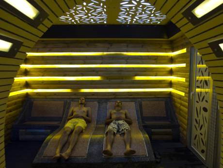 Palestinian men in the sauna room that also has a hot water pool at the new Techno Gym in Gaza