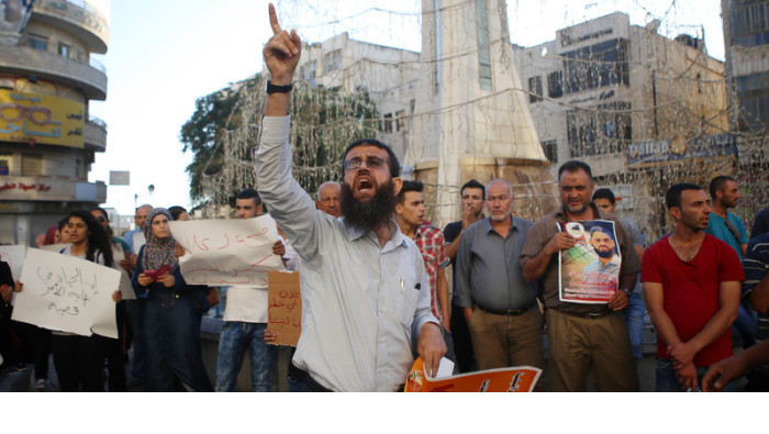 Freed prisoner Khader Adnan participates in a demonstration for Mohammad Allan on 14 in Ramallah