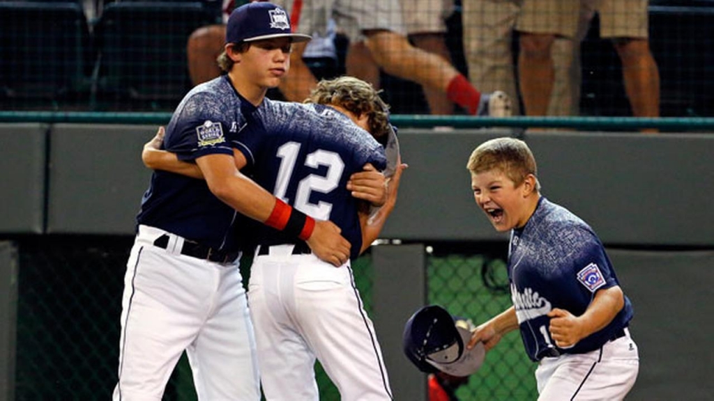 Lewisberry Pa.s Jaden Henline celebrates with teammates Cole Wagner left and Dylan Rodenhaber after getting the last out of a 3-0 win over Pearland Texas